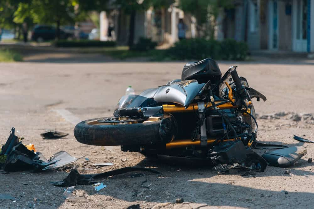 The,Motorcycle,Lies,On,The,Road,After,The,Collision.,Severe